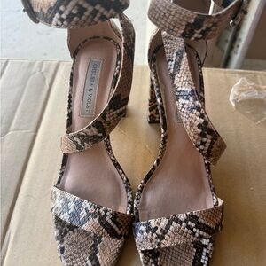 Chelsea & Violet Black and Tan Snakeskin Heels